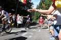 BelgiumÃ¢â¬â¢s Philippe Gilbert of the Quick-Step Floors team waves as he passes fans wishing him a happy birthday Royalty Free Stock Photo